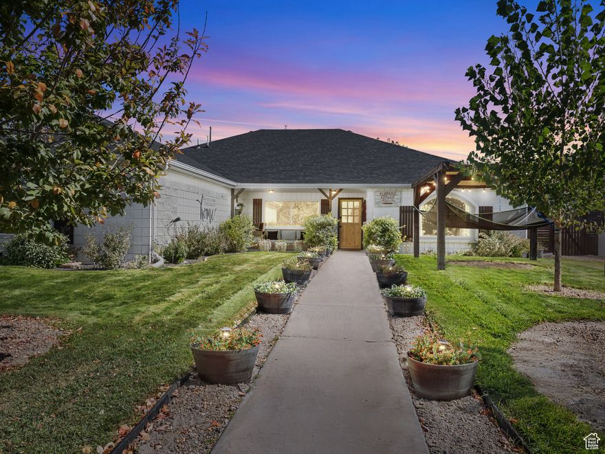 The perfect blend of comfort and updates all in one home.  Single-level living, a spacious three-car garage, and a fully landscaped yard set the stage for comfort. Major updates like a new roof, HVAC, and windows have already been done, so you can simply move in and enjoy. Top-end kitchen appliances, custom Groove exterior lighting, and yes-the hot tub is included-making this home truly ready for you.  The outdoor spaces are where memories are made: relax on the porch swing, gather under the pergola, sway in the hammock, or grow your favorites in the greenhouse and garden boxes. A built-in projector turns summer nights into backyard movie nights with friends and family. With RV parking, a fully fenced yard, and that included hot tub, the outside is as inviting as the inside.  Step inside to vaulted ceilings and an open layout filled with light. The primary suite is tucked away for privacy and features a beautifully updated ensuite with a jetted tub, separate shower, and walk-in closet. Three more bright bedrooms and a custom entertainment center complete the home.  Lovingly updated and designed for both comfort and joy, this home is move-in ready and waiting to welcome its next chapter.