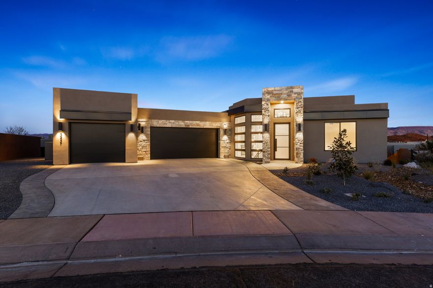 Modern 4-bed, 4-bath home with a walkout basement, located near Sand Hollow Resort. Enjoy sleek design, open living spaces, and stunning views in a prime location-perfect for relaxing or entertaining in Southern Utah's adventure hub.