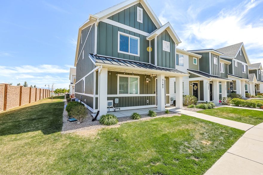 Stunning row-end townhome in the heart of Miller Crossing in Herriman! Offering lots of natural light and mountain views, this beautifully upgraded home features quartz countertops throughout, stylish lighting fixtures, and a striking herringbone accent wall that adds the perfect designer touch. The spacious 2-car garage comes equipped with built-in shelving for extra storage and convenience. Ideally situated between The District and Mountain View Village, you'll enjoy being just minutes from parks, shopping, dining, and entertainment-including the new Bees Stadium. With quick access to Bangerter Highway, commuting is effortless while still enjoying a welcoming neighborhood. Located in a pet-friendly community, this home truly offers the best of comfort, style, and convenience-don't miss your opportunity to make it yours!