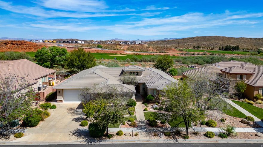 Beautiful one-owner home on the Coral Canyon Golf Course with stunning views! Designed for entertaining, this property features a private 2-room casita with separate entrance, a backyard putting green, and a large covered patio with adjustable louvered shade. Spacious primary suite with jetted tub and separate shower, plus generously sized guest rooms with walk-in closets. Tile flooring and custom plantation shutters throughout. Well-appointed kitchen with oversized refrigerator, walk-in pantry, and butler's pantry connecting to the formal dining room. All appliances included.
