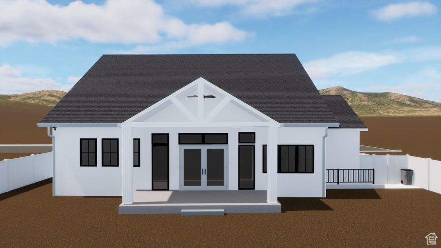 Welcome to your dream home in the heart of Mapleton-where thoughtful design meets timeless craftsmanship. 3D rendering link http://bit.ly/485gOzc This stunning 6-bedroom, 4.5-bathroom custom residence offers over 5,400 square feet of beautifully finished space, nestled on a flat 0.34-acre lot  Large windows, 11' living room ceilings, and upgraded lighting throughout the home flood the space with natural light and warmth. The open-concept main level is anchored by a striking floor-to-ceiling stone fireplace and features white and navy cabinetry, brass hardware, and a custom wood hood vent that brings a designer touch to the gourmet kitchen. Entertain with ease around the oversized island, or flow effortlessly to the covered back patio-perfect for evenings enjoying the mountain views. The luxurious primary suite offers a soaking tub, separate shower, and a walk-in closet with a window bench.  Every detail was considered-from wainscoting in the dining area to the built-in lockers in the mudroom for everyday ease. The fully finished basement includes a versatile 2-bed, 1-bath ADU with a full kitchen, private laundry, and separate entrance.  Additional highlights include upgraded lighting, a covered back patio, and an oversized 3-car garage with an extended third bay. Photos are representative and depict a similar home. Renderings and floor plans are for illustrative purposes only and may not reflect the final product. Estimated completion date Feb 2026.