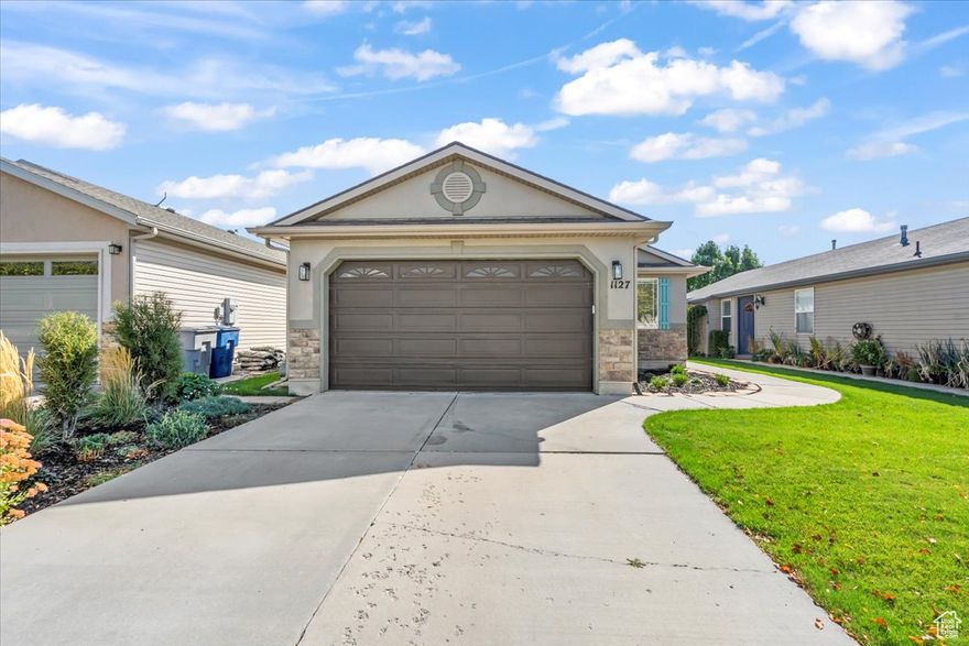 This well-maintained single-level home offers spacious living areas filled with natural light. The kitchen includes updated finishes, ample counter space, and direct access to the dining area for easy entertaining and everyday use. The property features comfortable bedrooms, modernized bathrooms, and versatile spaces that can be used for work, relaxation, or storage. All appliances, including the washer and dryer, are included, making this home truly move-in ready. The exterior provides excellent curb appeal along with a private backyard and patio area suitable for outdoor enjoyment. Located just minutes from downtown Salt Lake City, and close to shopping, schools, parks, and major roadways, this home combines functionality with convenience.