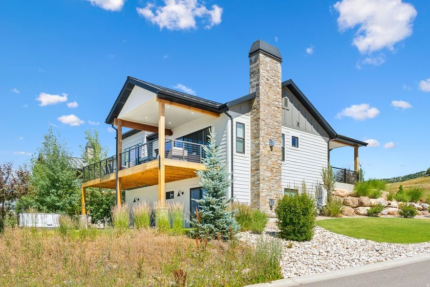 Wake up to sweeping, unobstructed panoramic views of Pineview Reservoir, Snowbasin, Nordic Valley, Mt. Ogden, Ben Lomond, and the entire Ogden Valley-this view is truly one of a kind. Located in the highly sought-after Bridges Community, this pristine home sits on one of the best lots in the neighborhood and is being sold fully furnished, making it the ultimate turnkey mountain retreat. Just bring your clothes and move right in! Enjoy the ease of low-maintenance living with HOA-provided landscaping, plus the incredible added value of nightly rental zoning. Inside, you'll find beautiful upgrades including radiant heat, a bright white kitchen, and quartz countertops throughout. The home has been thoughtfully improved with an expanded covered deck, extended laundry room, two-tone paint, and oversized glass double sliders to fully capture the breathtaking scenery. Additional features include an owner lockout closet, vaulted hot tub, epoxy garage flooring, and so much more! A rare opportunity in Ogden Valley-must see to fully appreciate.  Sq. ft. figures are provided as a courtesy estimate only and were obtained from tax records.  Buyer is advised to obtain an independent measurement.