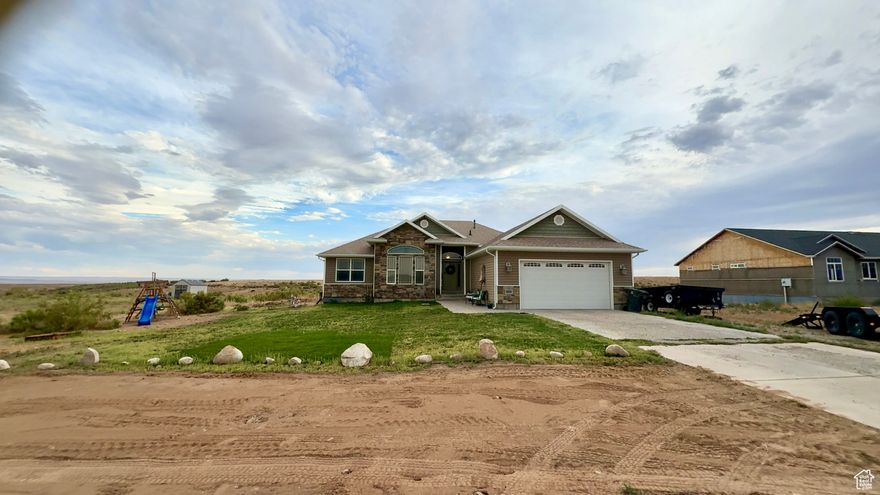 Gorgeous home in the Davis area. Over 4,000 s.f. 4 bdrm, 2 1/2 bath with partially finished basement. Bedroom downstairs just needs floor covering. Bathroom downstairs partially finished. Garage has built in shelving. There is a wood stove in the garage that seller will leave. Raspberry bushes, grape vines & asparagus plants in the yard.
