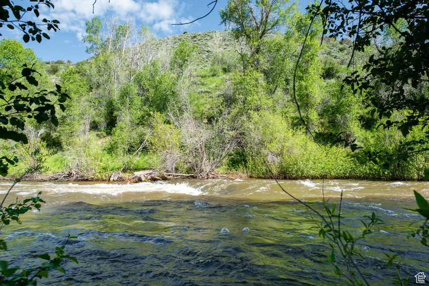 Weber River runs through property for approximately 1/4 mile! Property fronts Weber Canyon Rd for year round paved access. Fly fish on your own ranch. About 25 miles to Park City. Lovely trees. Pond and streams on property! Property in two parcels: 10 acres and 29.5 acres contiguous parcels.