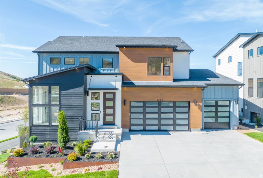 Luxury Meets Lifestyle in This Best-Selling Highland Plan at Canyon Point! Don't miss this incredible opportunity to own the most sought-after floor plans in the upscale Canyon Point community-perched above Silicon Slopes in one of the last premier mountain neighborhoods along the Wasatch Front! This fully finished Highland plan is loaded with over $261,000 in high-end features, including:  Main-level owner's suite with LVP wood-style flooring throughout  Gourmet KitchenAid appliance package: double ovens, 36" gas cooktop, vented hood  Massive 6x7 quartz island with thick 6cm countertops  Ceiling-height soft-close cabinetry, floating shelves, upgraded tile, and elegant black iron railing   Stunning and private canyon views.  Canyon Point offers a quiet, elevated lifestyle with unbeatable access to hiking and biking trails, while still being just minutes from shopping, dining, and top-rated schools. Community amenities include a luxury clubhouse, resort- style pool, tennis courts, basketball courts, and more. Bonus: Seller has already discounted the home by the full price of the finished basement AND is willing to contribute up to $25,000 towards a rate buy down or closing costs for use of sellers preferred lender.  Call me today to schedule a private tour. Projected completion date is end of July 2026.