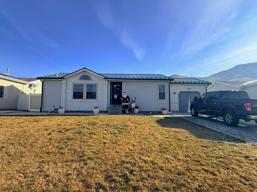 No showing until Open House. Beautiful 3-bedroom, 3.5-bath home with extensive updates throughout, including new fence, backyard, and deck (2020), windows (2021), roof (2022), siding (2024), and a remodeled kitchen with hardwood floors (2025). Located in a quiet neighborhood within walking distance to schools and parks. Each bedroom features a private bathroom, including a spacious basement suite with an oversized walk-in closet, jacuzzi tub, and separate walk-in shower. The fully fenced yard offers RV or boat parking, a large storage shed, and a covered deck ideal for entertaining. Move-in ready and meticulously maintained