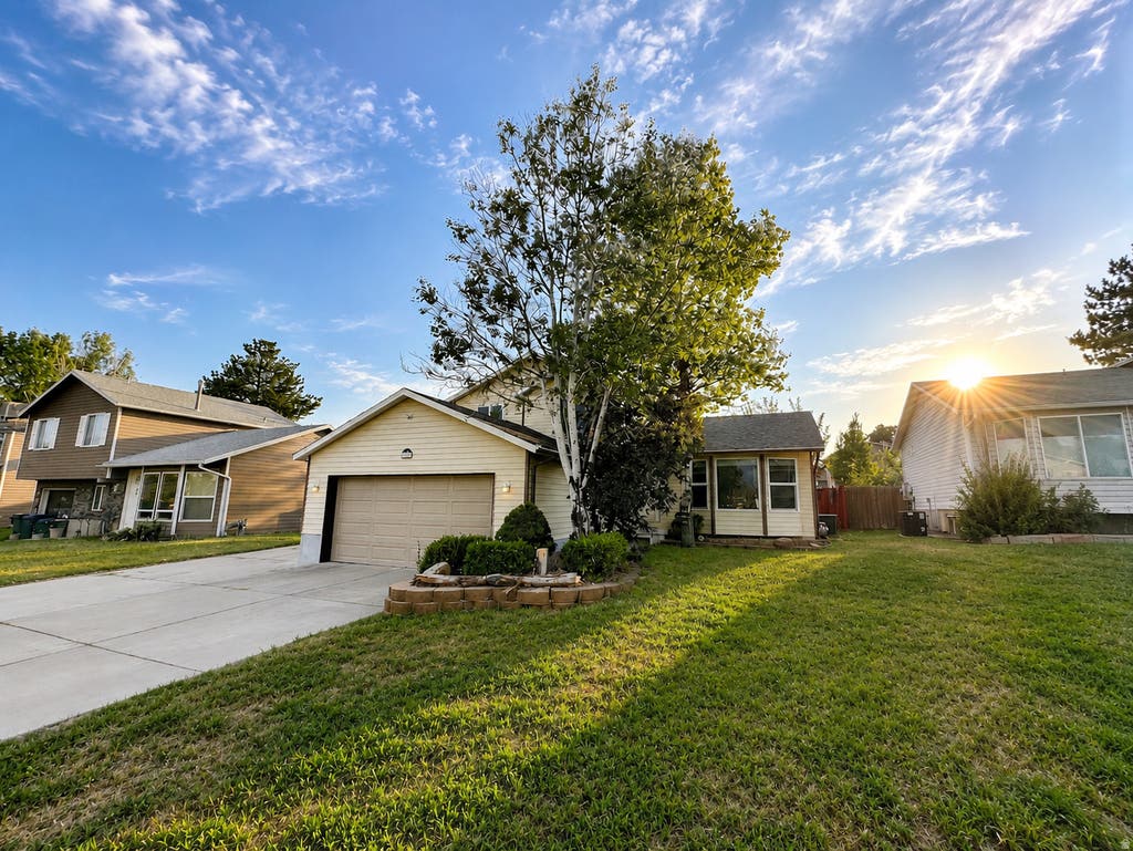 Photo of 6092 S LONGMORE DR W, Salt Lake City, UT 84118 (MLS # 2173841)