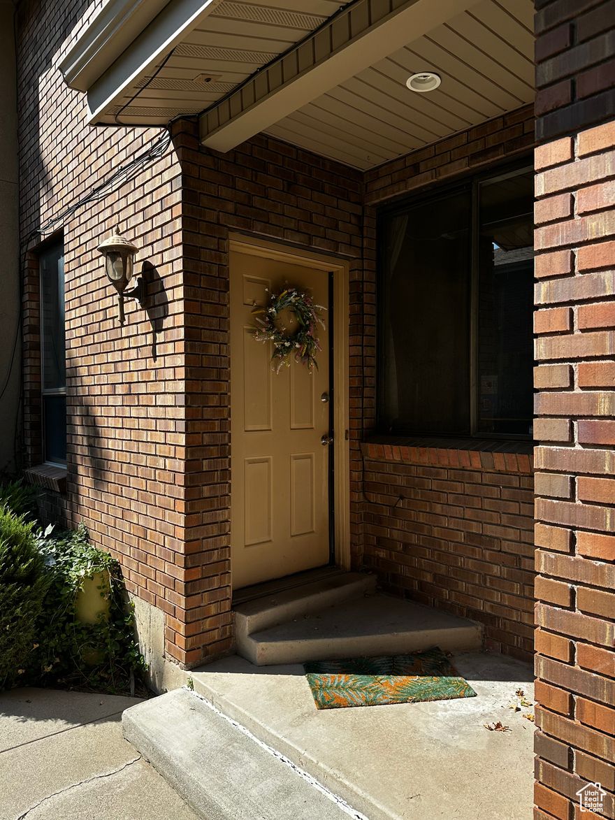 SPACIOUS UNIT!  This property has new tile installed on the main level, and upstairs.  Vaulted ceilings on main.  2 car garage.