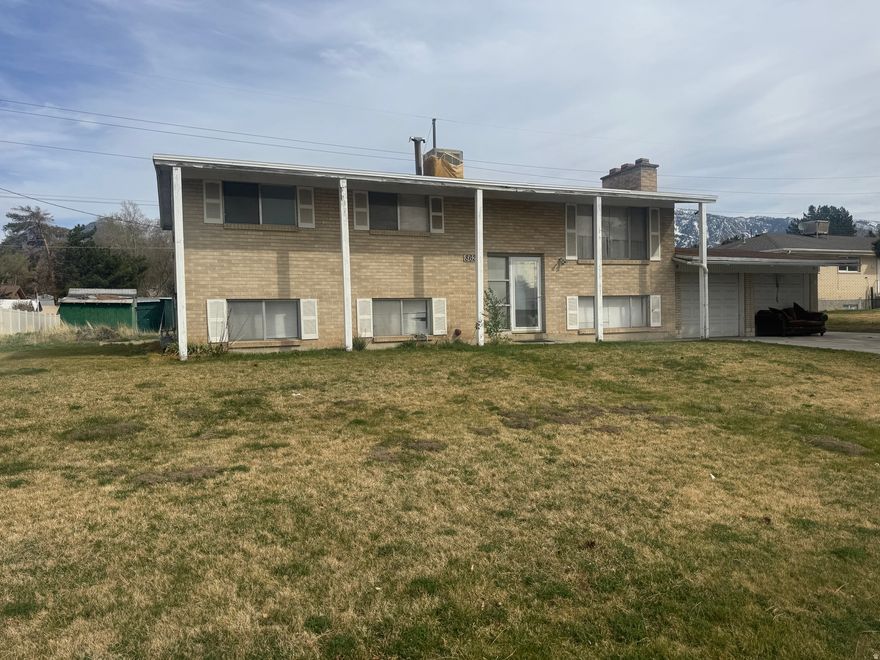 Great single family home, located in a prime Sandy location. Situated on a .44 acre lot, this property offers incredible views, and exceptional upside potential. This home includes 6 bedrooms and 3 bathrooms, a living room on each level, and a walkout basement entrance.  Contact agent for all showings.    Square footage figures are provided as a courtesy estimate only and were obtained from county records. Buyer is advised to obtain an independent measurement.