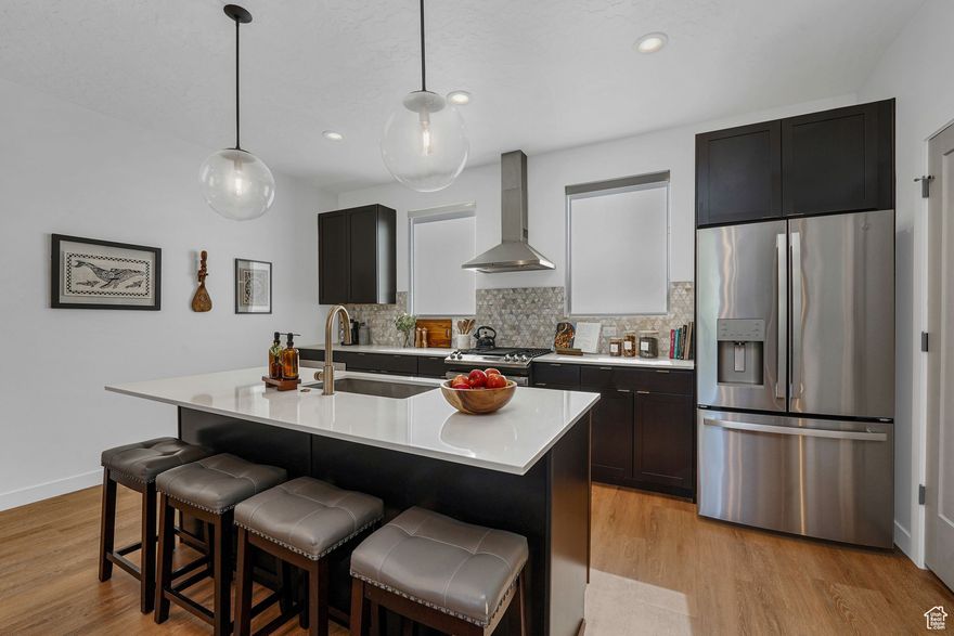 Skip the wait and cost of new construction. This like-new Cole West townhome is NIGHTLY RENTAL APPROVED and ideally located just 1 minute from I-15, with quick access to Ogden, Salt Lake, Hill AFB, and Snowbasin. The spacious floor plan features a rare DUAL PRIMARY SUITE, abundant natural light, and quality soundproofing. With an attached 2-car garage, pet- & kid-friendly green space, and investment potential. This home blends comfort, convenience, and opportunity. Don't settle for ordinary--experience the perfect blend of style, convenience, and community in this exceptional townhome. Some furniture can be included with a full-price offer. See exclusion remarks or contact agent for a list.