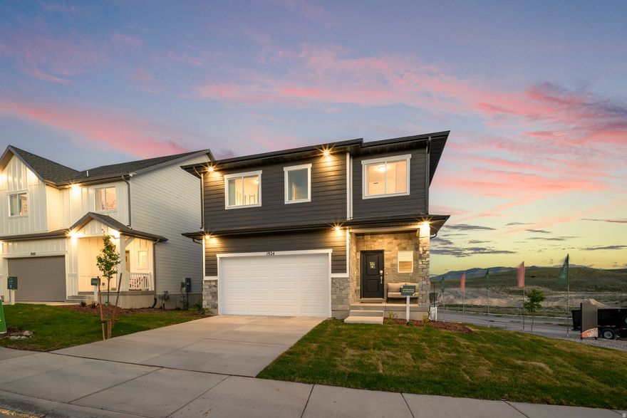 Former model home-never lived in! This 3 bed, 2.5 bath home offers 2,400 sq ft on a corner lot with a basement entrance for added flexibility. Featuring quartz countertops, upgraded finishes throughout, and a 2-car garage. Located in the Wildflower community with access to a private lake, trails, and great amenities.
