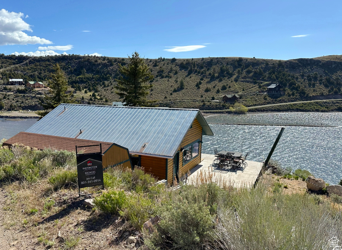 Private Cabin Retreat with Stunning Panguitch Lake Views! Escape to your own private haven with this charming 2-bedroom, 2-bathroom cabin, perfectly perched on 0.59 acres with breathtaking panoramic views of Panguitch Lake.  Just steps away from world-class fishing, boating, and scenic hiking trails, this mountain retreat is the ideal getaway for outdoor enthusiasts. Inside, enjoy a cozy open-concept living and kitchen area, perfect for relaxing after a day of adventure. Step outside to your spacious porch, where you can unwind and take in the unforgettable sunrises and sunsets over the lake. Whether you're seeking a peaceful escape or a basecamp for outdoor recreation, this cabin offers the best of both worlds. Contact listing agent today for showing!