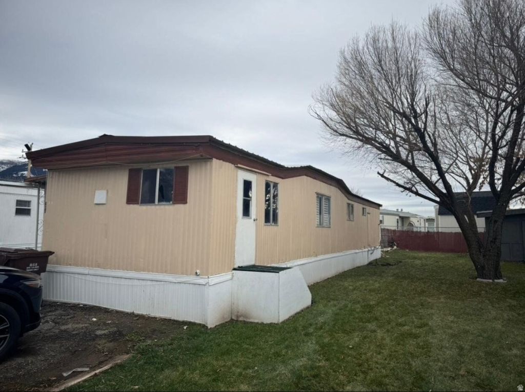 Photo of 204 2491N HIGHWAY 89 #204, Pleasant View, UT 84404 (MLS # 2128139)