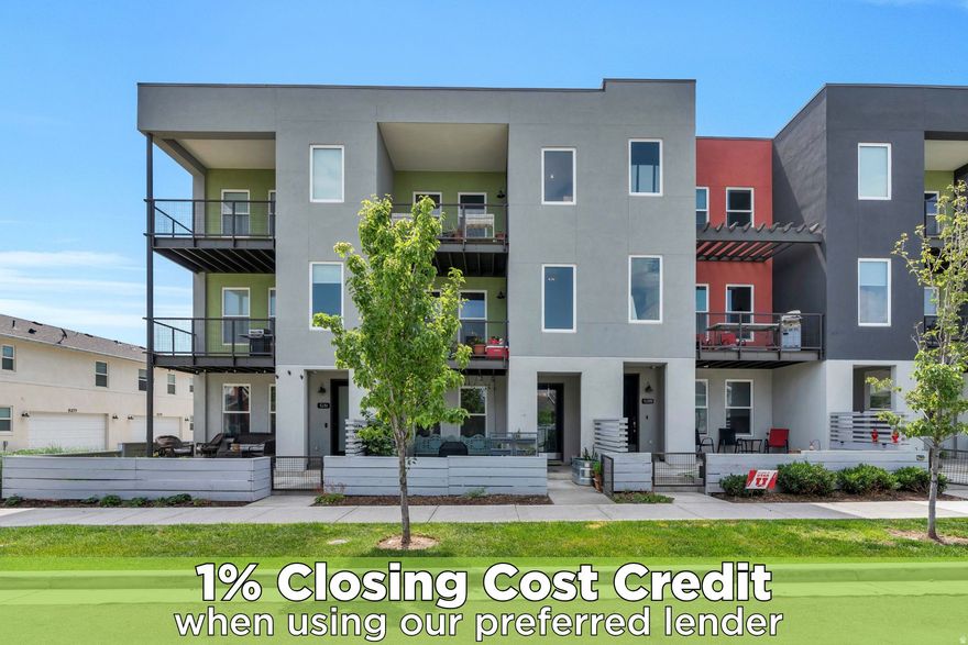 Charming Daybreak home located in one of the area's most desirable and active communities!   A welcoming fenced patio greets you at the entrance, offering a covered space perfect for relaxing, gardening, or enjoying outdoor dining. The main floor features a convenient bedroom with an ensuite bathroom and direct access to the two-car garage, ideal for guests or a private office space.  Upstairs, the sun-filled Great Room is highlighted by expansive windows and beautiful faux wood flooring, creating an inviting space for gathering and entertaining. The pristine kitchen showcases floor-to-ceiling cabinetry, a large quartz island with built-in sink and breakfast bar seating, stylish pendant lighting, custom tile backsplash, and stainless steel appliances. The adjacent dining area opens to a covered balcony, perfect for entertaining or enjoying your morning coffee.  The second level includes a spacious family room with flexible layout options. On the third floor, the primary suite offers a peaceful retreat with a generous layout and a versatile nook that can serve as a workspace or sitting area. The ensuite bathroom features custom flooring, a private toilet and shower, and a walk-in closet. Additional bedrooms provide excellent flexibility for a home office, gym, library, or guest space.  This home also includes solar upgrades, offering energy savings and lower utility costs.  Ideally located with easy access to S. Jordan Parkway, shopping, dining, and entertainment, as well as nearby Ewok Park, Bowstring Park, and Oquirrh Lake. Enjoy all that Daybreak has to offer, including splash pads, community gardens, sand volleyball, basketball and tennis courts, over 30 miles of trails, summer concerts, farmers markets, and more.  Don't miss the opportunity to make this fantastic home yours!