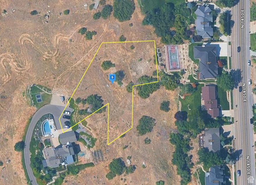 Located in the highly desirable Oak Hills area on the east bench of Provo, this 0.9-acre vacant lot offers stunning views of Mt. Loafer, Utah Lake, and the entire Utah Valley. With no HOA restrictions, you'll have the freedom to design and build your dream custom home in one of Provo's most sought-after neighborhoods. Outdoor enthusiasts will love being just minutes from Rock Canyon Trailhead, the Bonneville Shoreline Trail, and Y Mountain, while Rock Canyon Park and other city parks are close by for everyday recreation. Overlooking BYU and the valley below, this lot combines privacy, breathtaking scenery, and an unbeatable location.