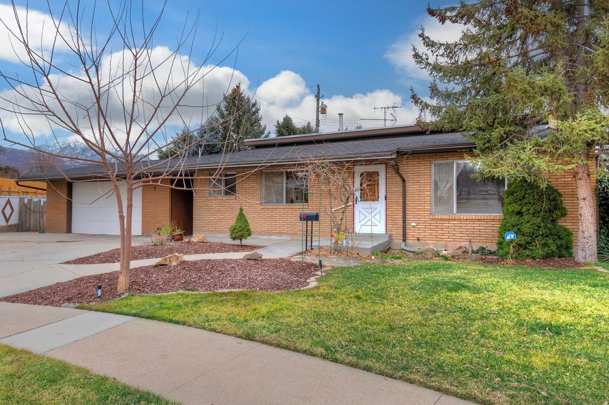 Amazing opportunity to own this fabulous home in a desirable location of Millcreek, tucked away on a quiet cul-de-sac with a nice-sized fully fenced lot, an extra-large two-car garage, and a covered patio. This residence features three bedrooms and two bathrooms across over 1,700 square feet of an open floor plan, offering plenty of space to update and personalize to your tastes. Enjoy convenient access to great restaurants, shopping, and entertainment, making this location as lifestyle-friendly as it is value-rich. Don't miss the chance to make this home your own and build equity in a sought-after neighborhood.