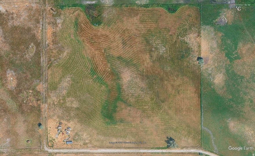 A total of 10 acres when combined with MLS 2087178 (or just 5.01 acres for this parcel at $400,000) as available in Salem close to I-15 and all the coming development! This land is in Greenbelt and zoned Agricultural and is IDEAL FOR LAND-BANKING INVESTMENT!  The Seller is motivated and will consider all reasonable offers. There are 0.5 shares of water included with each 5 acre parcel (or 1 share for 10 acres).Their preference is to sell the 10 acres together.  This may NOT be built on as a residential property unless you can get permissions from all the neighbors first and bring utilities from 1040 North.