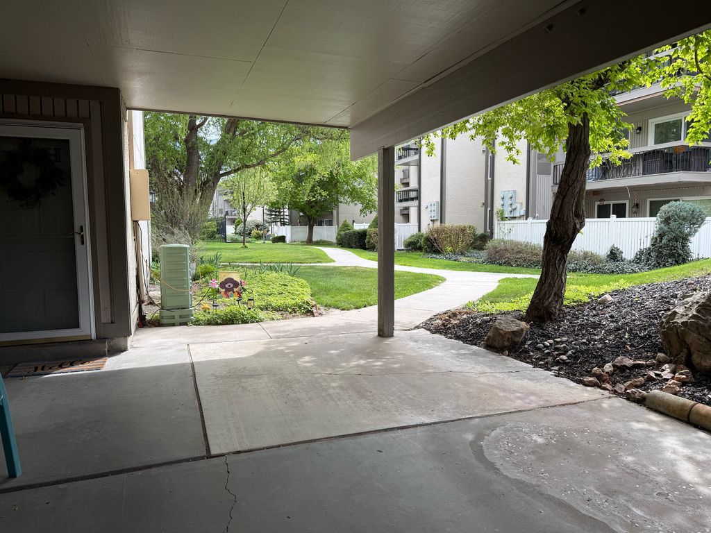 Photo of 5389 S WATERBURY DR E #G, Salt Lake City, UT 84121 (MLS # 2149932)