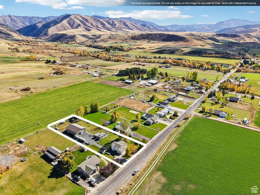 Discover your slice of paradise in this exclusive Cache County neighborhood! Situated on an acre of land, on the back side of POWDER MOUNTAIN, recreation is ride outside your front door. This inviting 5-bedroom tri-level home offers stunning mountain views, mature fruit trees, and plenty of space for all your hobbies and animals. Bring your horses-there's room for them, too! The property features a massive 60x40 ft shop with power, insulation, and concrete floors, perfect for a workshop, business, or storage for all your toys. Additional outbuildings provide even more flexibility for your needs. Inside, enjoy 2.5 bathrooms, comfortable living spaces, and a layout that offers both function and flow. Whether you're relaxing on the porch, working in your dream shop, or watching the sunrise over the mountains, this property has it all-peace, privacy, and endless potential. This one won't last long-schedule your showing today!