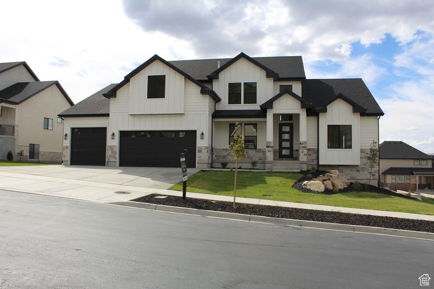 **Gorgeous new home is now within 30 days of completion and ready for a contract!**  Situated on the hillside overlooking Salem valley, this home is a perfect blend of elegant design and everyday comfort.  The heart of the home is a modern chef's kitchen, featuring double wall ovens, a gas countertop range, quartz countertops, and an oversized island perfect for everything from casual breakfasts to evening entertaining. Under-cabinet lighting sets the mood, and a large back deck opens to sweeping vistas of the valley below.  The spacious main floor primary suite offers a private sanctuary with a freestanding soaking tub, walk-in shower, and premium finishes. Upstairs you'll find four generous bedrooms and a thoughtfully designed bathroom offering double vanities and a separate shower/toilet area-perfect for busy mornings.  Square footage figures are provided as a courtesy estimate only and were obtained from building plans.  Buyer is advised to obtain an independent measurement.  Agent is a relative of seller.