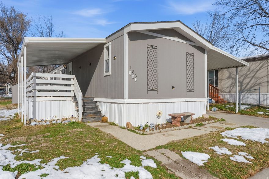 Newly remodeled mobile home featuring fresh paint, new flooring, updated light fixtures, bathroom vanities, and new baseboards throughout. Swamp cooler has been removed and the roof has been updated. Central air. Completely move-in ready!