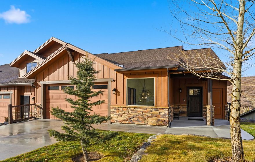 This luxury townhome was built in the final phase of Black Rock Ridge and completed in 2022.  Sitting at the top of the cul-de-sac with breathtaking views of Park City Mountain Resort this popular main floor living floorplan includes the finest upgrades offered to include two fireplaces, Viking appliances, quartz countertops, hardwood floors, steam shower and heated floors in primary bathroom, triple zoned heating/AC, epoxy garage floors, sonos system in theater room, hot tub and much more!  Black Rock Ridge offers hiking and biking trails that surround the community and includes close access to Park City Main Street, the new Deer Valley East Base Village, Jordanelle Reservoir and is a 40 minute drive to Salt Lake City's International Airport!  Located in a prime location within the community, don't miss your opportunity to own this unit!