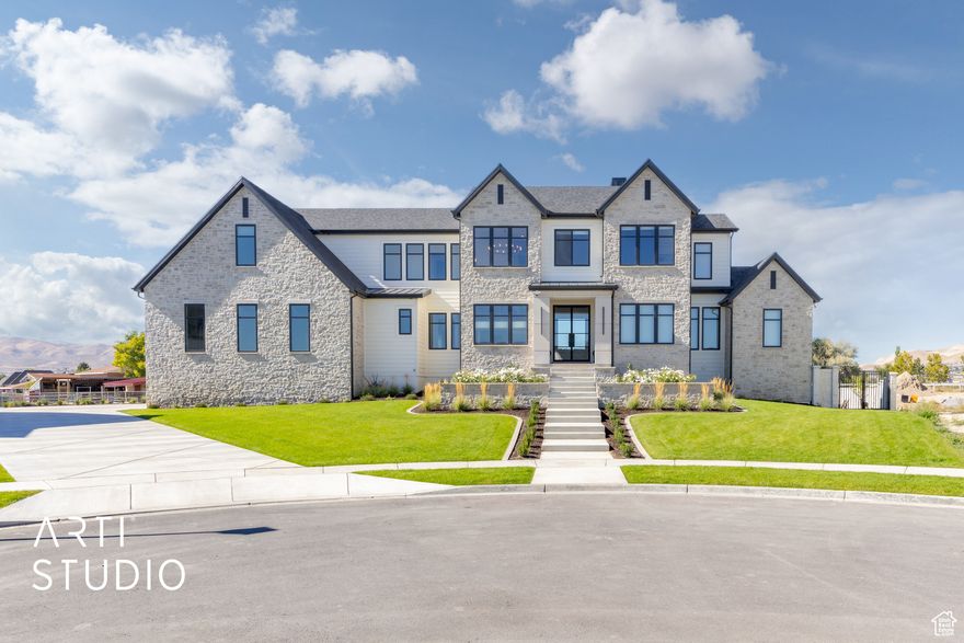 This beautifully designed and decorated custom luxury home built in 2025 is stunning! It combines sophistication with outdoor serenity on an immaculate .6 acre lot. The home features six bedrooms and four bathrooms plus 2 half baths. Also included are a pantry, prep kitchen, home office, gym with sauna, bonus room, 2 indoor fireplaces, an outdoor fireplace and a gas fire pit. The home boasts a light filled open concept main level with soaring ceilings, engineered hardwood floors, elegant inset cabinetry, wolf/subzero appliances, and quartz countertops throughout. Outdoors there is a large deck that overlooks a spacious well landscaped yard. Did you say pickleball? The indoor pickleball/basketball court is professional grade including a viewing deck, a half bath and a storage area, complete with heat and ac, totaling 2480 sq ft. This is an extraordinary opportunity with a perfect blend of elegance and enjoyment.
