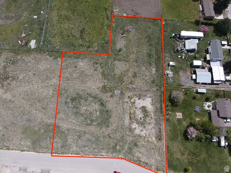 Don't miss this incredible opportunity to own a large and beautifully lot situated in one of Heber Valley's most desirable new family neighborhoods. This property offers breathtaking, unobstructed 360 views of all the surrounding mountain ranges, providing a stunning backdrop in every direction. The lot is fully improved with gas, water, electricity, irrigation, sewer, and cable making it ready for you to bring your vision to life.