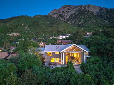 Photo of 4504 S ABINADI RD E, Millcreek, UT 84124 (MLS # 2156433)