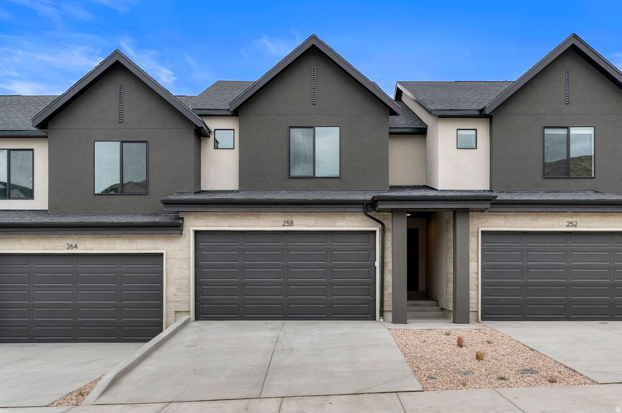 This Oakridge townhome offers a walkout basement with mountain and valley views! An outdoor main level covered back deck with views of Timpanogos Mountain and sweeping views of the valley and lake. The home has 4 bedrooms, 2.5 bathrooms, a 2-car garage, and open family, dining and kitchen layout. Features include Whirlpool stainless steel appliances (gas range stove, microwave and dishwasher), quartz countertops, laminate flooring, modern cabinetry, pantry, an unfinished basement, and a concrete covered back patio, perfect for outdoor living. Upstairs includes a laundry area, full bath, and a spacious primary suite with a private bath and walk-in closet. Home includes Smart Home Package, radon system, and builder warranty. Ask me, Tara, about our special Interest Rates and loan options with our preferred lender, DHI Mortgage. Including up to $5,000 toward closing costs. The actual home may differ in color, material, and/or options. Pictures are of a finished home of the same floor plan and the available home may contain different options, upgrades, and exterior color and/or elevation style. Square footage figures are provided as a courtesy estimate only and were obtained from building plans. No representation or warranties are made regarding school districts and assignments; please conduct your own investigation regarding current/future school boundaries.