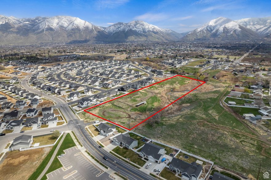 Discover an extraordinary opportunity in highly sought-after Mapleton! This magnificent 7.48-acre parcel (26:056:0050 and 26:059:0070) offers breathtaking mountain views and unparalleled potential.   Imagine your dream estate nestled on this picturesque, gently sloping land, complete with the soothing sounds of a natural creek traversing the southern boundary.   While currently zoned A-2 with the exciting potential for equestrian pursuits, this property can be rezoned for residential development, allowing for the creation of a private, expansive single-family sanctuary or the possibility of subdividing into a couple of premier building lots (subject to city approval and road placement). Utilities are conveniently located in the adjacent street, streamlining your building plans. Embrace the tranquility and natural beauty of Mapleton while securing a unique piece of Utah's most desirable landscape.   Don't miss this rare offering!  Square footage figures are provided as a courtesy estimate only and were obtained from  the Utah County Assessor's Office .  Buyer is advised to obtain an independent measurement.