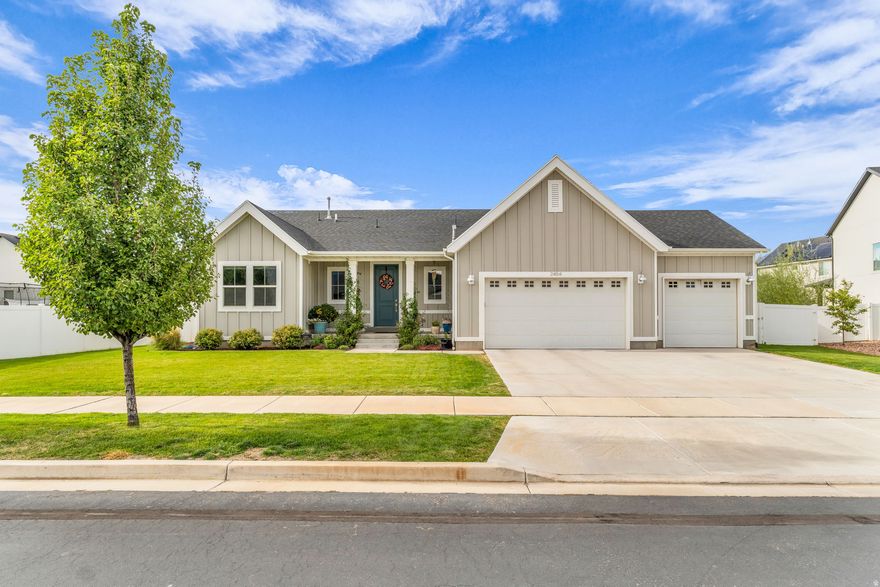 Gorgeous rambler in desirable Mapleton Grove community. Mountain views and an open concept floorplan, designed for comfortable living and entertaining. Step outside to a covered patio, overlooking a truly dreamy backyard sanctuary. Professionally landscaped with a tranquil water feature, vibrant flower gardens, multiple sitting areas, and a dedicated garden space. A separate dog run provides a convenient pet area without disrupting the beauty of the yard. The kitchen is a standout with a large quartz island, double ovens, gas range, brand new dishwasher, and space for a full dining table. Enjoy backyard views through the oversized picture window that's perfect for watching hummingbirds while you cook or clean. The inviting living area features a cozy gas fireplace with blower. The spacious primary suite offers a private retreat with dual sinks, separate tub and shower, and a walk-in closet. Large laundry room is conveniently located on the main level, along 2 additional bedrooms and full baths. Newly finished basement has high ceilings, custom lighting, two expansive family rooms and a wet bar, dedicated storage room, two large bedrooms, and a  bath. 3-car garage with room for toys.