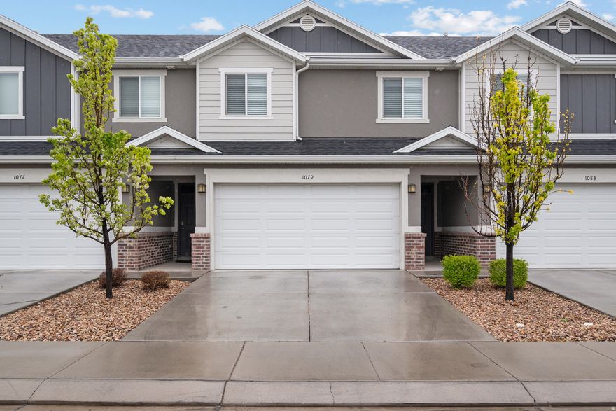 Seller Financing Rate of 4% Possible. Beautifully maintained townhome in the highly sought-after Lakeview Fields community, offering the perfect blend of comfort, convenience, and low-maintenance living. Tucked into a quiet, well kept neighborhood, this light filled home welcomes you with soaring 18-foot vaulted ceilings and an open layout designed for both everyday living and easy entertaining. The spacious kitchen features quartz countertops and ample prep space, seamlessly connecting to the main living areas. The primary suite provides a private retreat with vaulted ceilings, a separate shower and  soaker tub, with a generous walk-in closet. Small yard space maintained by the HOA. Enjoy the ease of HOA living with internet and cable included, along with access to community amenities including a clubhouse, pool, and gym everything you need. Ideally located near shopping, dining, parks, and schools, UVU and BYU, with quick access to major roads and I-15 this home offers both tranquility and convenience in one of the area's most desirable communities.