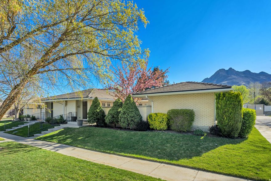 Highly sought after Holladay Garden Home in an exceptional 55+ community. Enjoy over 1,700SF of beautifully updated single level living space nestled at the base of Mt. Olympus with a private patio, clubhouse, and pool. Carefree living at it's best with weekly yard care and snow removal provided. RV parking available. What more could you want?