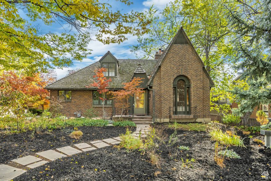 Nestled in one of Salt Lake's most prestigious neighborhoods, this timeless two-story Tudor exudes charm and elegance. Featuring 4 bedrooms and 3 bathrooms, the home blends classic architecture with modern comfort. Stunning hardwood floors, rich wood detailing, and graceful design invite warmth and sophistication. Set on a tree-lined street surrounded by mature landscaping, the property offers privacy and beauty. Enjoy an incredible location just minutes from the University of Utah, nearby parks, shopping, and vibrant downtown Salt Lake City. A truly special home in an exceptional setting.