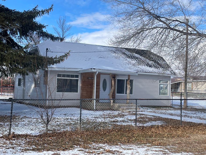 RARE FIND! Horse property in NEOLA! Charming completely renovated 2 bed 1 bath home, discover the perfect blend of comfort, charm and country living in this beautifully renovated home. Featuring a bright open layout. Situated on .81 acres the land is ready for your animal with corrals pasture and 1 share of BIA irrigation water. Mature apricot and apple trees and a detached garage with attached storage shed provide plenty of storage space for your outdoor gear. Come see this amazing property today! Buyer to verify all information.