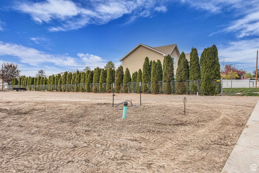 Fully prepped for your custom build. Bring your builder of choice and design a home that reflects your lifestyle and goals, or take advantage of the developer's pre-approved net-zero building plans (renderings attached). Lot 101 is a rare find - an exceptional, level homesite nestled in the heart of Millcreek, showcasing expansive views of the Wasatch Mountains and an inspiring setting for your future home. PLAT MAP HAS BEEN FULLY APPROVED AND RECORDED. This premium lot comes equipped with stubbed power, sewer, and water (both culinary and irrigation) - a $95k value! PRE-APPROVED NET ZERO BUILDING PLANS and REScheck Energy Compliance Certificate also INCLUDED, each thoughtfully designed to support sustainable living and superior energy performance. Together, the above creates a comprehensive, ready-to-build package that allows for swift construction, if desired. The proposed 4,674 sq. ft. residence features refined architectural details and an attached one-car garage, with the option to add a detached two-car garage - bringing the total to THREE GARAGE SPACES - AND a private ACCESSORY DWELLING UNIT that supports additional income or multi-generational living. Located in a vibrant and well-connected neighborhood, this homesite offers easy access to Brickyard Plaza, the new Millcreek City Center, Harmons Grocery, St. Mark's Hospital, VASA Fitness, TJ Maxx, Kohl's, and more. Commuting is effortless to the University of Utah, Westminster College, Park City, and SIX renowned ski resorts. TOUR OUR PRE-BUILT NET ZERO MODEL HOME in the same subdivision (call for additional details). Buyer to verify all to own satisfaction.