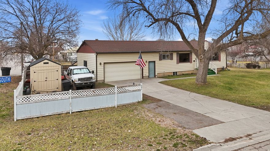 Super clean, cute, and cozy home located in the heart of Preston! This well-maintained property features a fully fenced backyard and includes two outbuildings, providing excellent additional storage or workspace. Major updates have already been completed, including a newer roof, rain gutters, furnace, and central A/C for added comfort and peace of mind. The garage offers convenient overhead storage, and the home has been lovingly cared for throughout. Inside you'll find a new basement bathroom, an updated upstairs bathroom, and tasteful improvements to the kitchen and dining area. The basement features a wood-burning fireplace, creating a warm and inviting space for relaxing or entertaining. You'll also appreciate the large storage rooms and dedicated laundry area, offering plenty of functional space. This solid home has so much to offer-schedule your showing today! Be sure to check out the 3D tour and video tour links for a full look at the property. Buyer to verify all information.