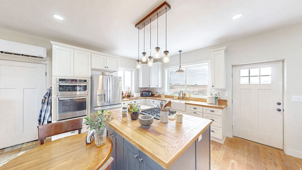 Photo of 11840 N RIVER BOTTOM RD #22, Nephi, UT 84648 (MLS # 2143429)