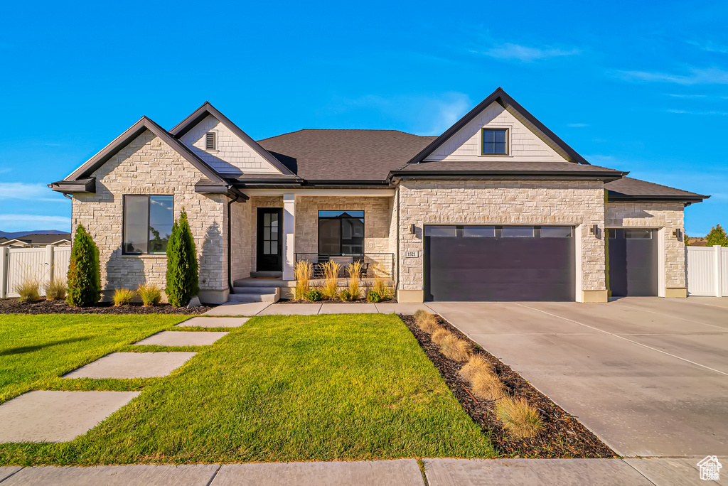 Stunning 6-bed, 5-bath home in Eagle Mountain's Overland Estates! With 2 kitchens, a finished walk-out basement, and a 0.39-acre yard with gazebo, play set & trampoline. This home offers space and flexibility for your lifestyle and is a rare find near top schools, parks, and amenities; schedule your tour today! Buyer and Buyers Agent to Verify All. Square footage figures are provided as a courtesy estimate only and were obtained from WFRMLS . Buyer is advised to obtain an independent measurement.