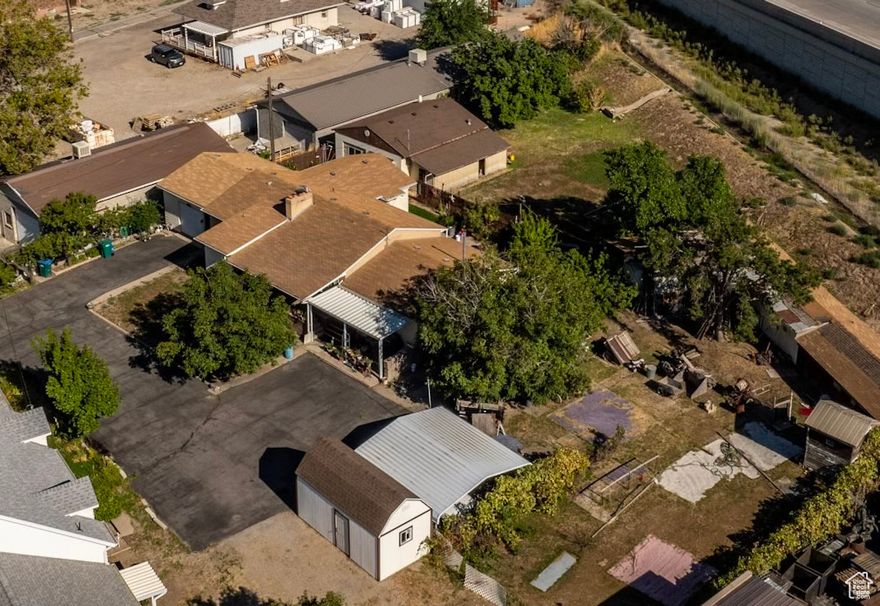 Unlock the potential of this exceptional .75-acre parcel, strategically located in the heart of Lehi along the bustling State Street corridor.  Zoned for both residential and commercial use, this versatile property offers endless possibilities for savvy investors and visionary developers.  With convenient access to I-15, just minutes away, your project will benefit from high visibility and easy connectivity.  Whether you're looking to build a dynamic commercial space or keep the home and do renovations, this opportunity is ideal for those with a forward-thinking mindset.  Don't miss out on this chance to make a significant impact in a rapidly growing area!