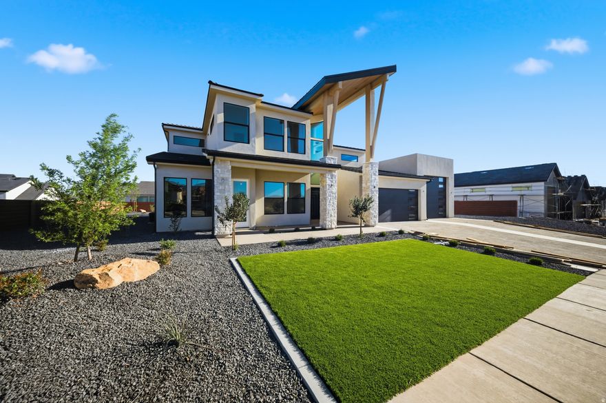 Striking new construction with modern design and flexible living spaces. This 5 bed, 4.5 bath home features an attached casita ideal for guests or potential rental income. A 2-car garage plus oversized RV/boat garage and additional parking offer exceptional functionality. The thoughtfully designed layout includes an extra upper-level family room, a dedicated theatre, and a spacious primary suite with a second laundry area. Enjoy seamless indoor-outdoor living with a covered deck and patio, perfect for entertaining or relaxing. A rare combination of style, space, and versatility in a beautifully designed spec home! Outdoor living is equally impressive with a covered deck and patio, perfect for relaxing or hosting gatherings while enjoying the surrounding views. Clean architectural lines, modern finishes, and a well-planned layout make this home as functional as it is striking. A rare combination of design, space, and versatility this home is built to support the way you live today.