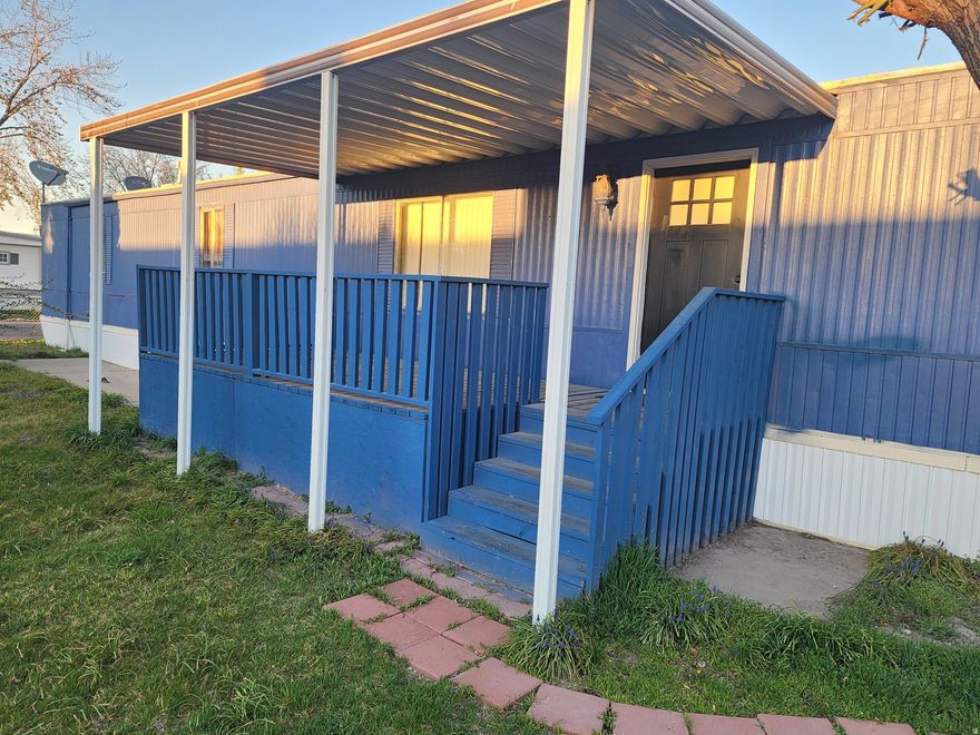 Larger than your average single wide! Corner lot! Each end has its own room and bathroom! Meet in the middle for breakfast! This home is ready to be made yours! Home features 2 bedrooms and 2 bathrooms along with a very large living room. Plenty of space to make it a 3 bedrooms if needed. We have MANY financing options for this type of property. Call today! Sq. Ft. provided as a courtesy measurement only. Buyer/Buyer Broker to verify all information.