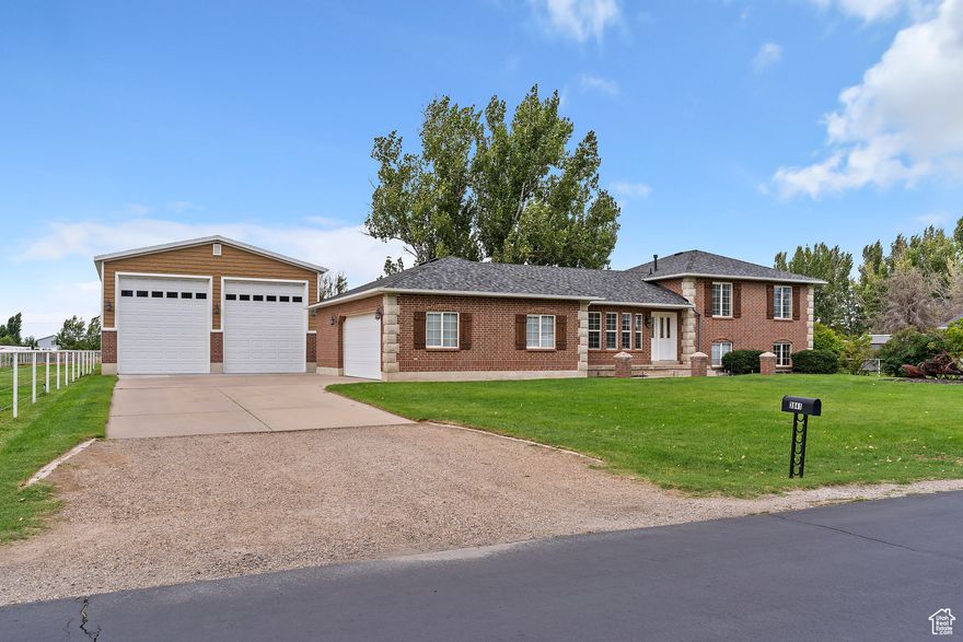 Fresh Interior paint. Separate 30X40 detached Shop w/12' wide X 14' tall roll up garage doors with openers, and 2 covered patio's. Main garage 18' X 22'+ 12'X12' work area and 220v. Excellent horse and livestock fencing. Well maintained horse barn w/fenced runs and covered hay storage. Livestock shelters. Tack room.Triple wide driveway, RV parking. This property is well maintained and in excellent condition. Easement access to pasture and arena from 4000 So. North driveway shared access to barn yard for turn around. Buyer to verify all information. Shown by appointment only.