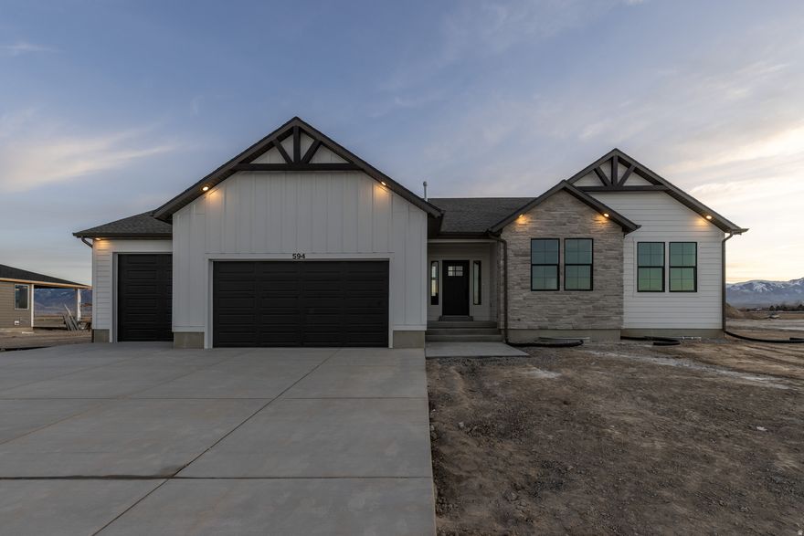 This home truly has it all! You'll love the 14' wide third-car garage with a 10x10 door, the huge walk-in pantry, and tile flooring in both the mudroom and laundry room. 12' Great room ceiling! There are upgrades throughout the home-far too many to list. This is one you really need to see in person to appreciate the space, quality, and thoughtful design.  Square footage figures are provided as a courtesy estimate only and were obtained from the plans. Buyer is advised to obtain an independent measurement.