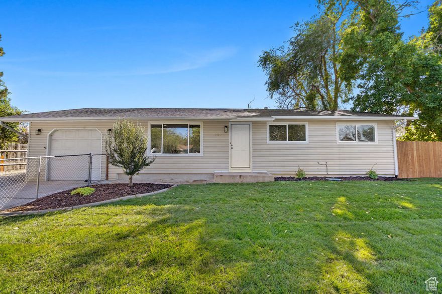 ** Open House Oct 11 from 9am-12pm ** Discover this beautifully remodeled 6-bedroom, 3-bath home in a quiet Grantsville neighborhood just steps from the high school. Every detail has been thoughtfully updated-featuring a brand-new kitchen and bathrooms with sleek quartz countertops, new flooring throughout, and all new doors and trim. Enjoy peace of mind with all new plumbing, light fixtures, switches, and outlets, plus a new water heater and stainless steel appliances. The exterior is just as impressive, with a large deck perfect for entertaining, a spacious shed for extra storage, and a brand-new sprinkler system and fresh sod in the front yard. Move-in ready-schedule your showing today! Square footage was obtained from an independent measurement. Buyer is advised to verify all information.