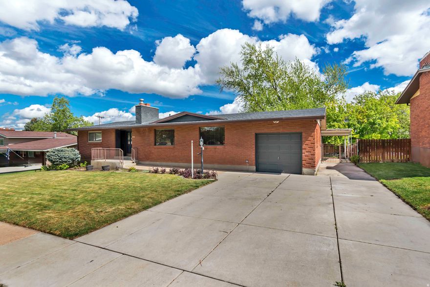 Beautifully updated all-brick rambler in a highly sought-after South Ogden neighborhood, just minutes from McKay-Dee Hospita. This move-in-ready home features a fully remodeled interior with new kitchen cabinetry, updated bathrooms, fresh paint, modern lighting, and new flooring throughout. The inviting main living area showcases custom built-ins and French doors, adding warmth and character. Downstairs, a standout feature awaits, a hidden speakeasy-style bar in the basement, perfect for entertaining. Enjoy a fully fenced yard with a covered deck, ideal for relaxing or hosting gatherings. With a new roof and extensive updates throughout, this home offers the perfect combination of style, function, and location.