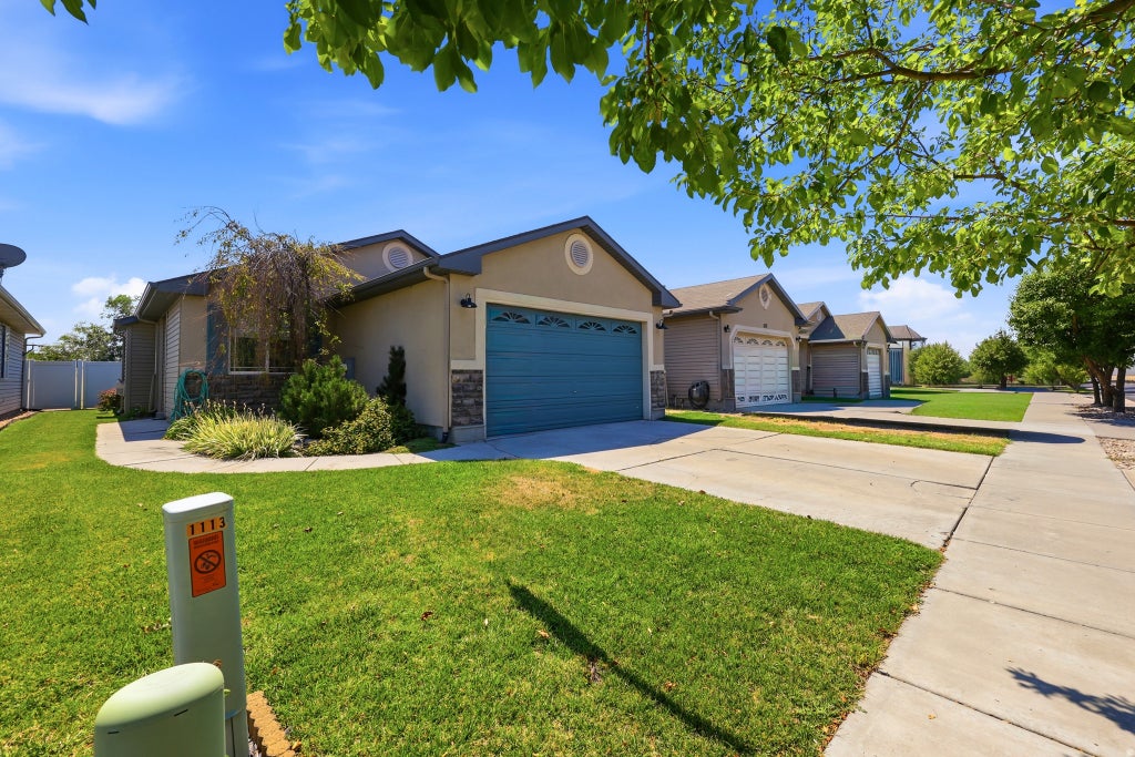 Photo of 1113 W HAWORTH DR. DR N, North Salt Lake, UT 84054 (MLS # 2176806)