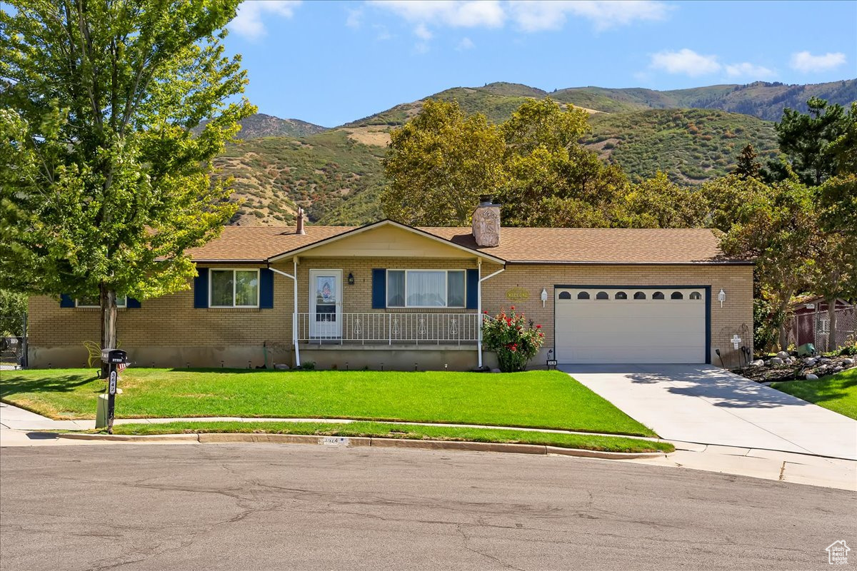 PRICE IMPROVEMENT! SAVE $10,000. SWIMMING ANYONE! This wonderful brick home includes an 18x36 absolutely beautiful HEATED swimming pool w/electric cover ready for you! Layton City Utah beauty! The yard is beautiful/well cared for with mountain views galore* You will feel like you are in the mountains! New pump & relay for secondary irrigation water* There is a covered deck to keep you cool in the summer & dry in the winter* 10x12 Shed* Inside the home is a formal living w/wood burning fireplace & formal dining (used to be bedroom/could switch back), Large kitchen w/brand new dishwasher (Oct 25) & nice dining leading to garage w/ample room for 2 cars plus all the workshop items* Garage has attic storage as well & a new driveway* Hall bath remodeled 2 yrs ago* Gorgeous laminate flooring in main areas* Awesome L shaped family room downstairs with built in cabinets, woodburning stove, 3/4 bath, 2 Bedrooms (one doesn't have a window) & craft room/den as well. All air vents were cleaned & an air purifier installed 2025. All appliances stay! Tankless water heater 10 yrs, fridge 1 yr, windows installed 2010 ish* AND soooo much more! Call me for a private showing today! Home is occupied! Please make an appointment (very easy to show)! This won't last long